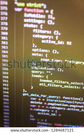 Programmer working in a software develop company office,  PHP code abstract technology background,   Programmer inspecting his code on computer screen Abstract software process,  Cyber space concept