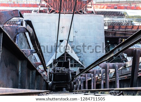 Metal structures of an old metallurgical plant. Industrialization