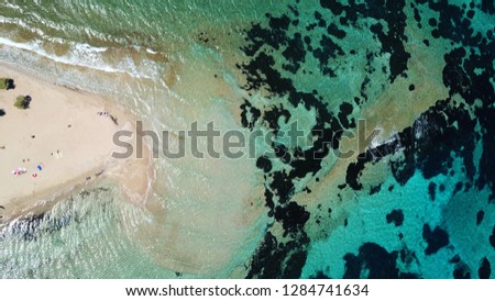 Aerial drone photo of tropical caribbean exotic bay with white sand beach and beautiful turquoise and sapphire clear sea