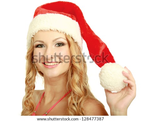 Portrait of a beautiful woman wearing a santa hat ,isolated on white background