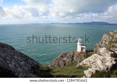 Lighthouse on The Sheeps Head West Cork Ireland Royalty-Free Stock Photo #1284785662