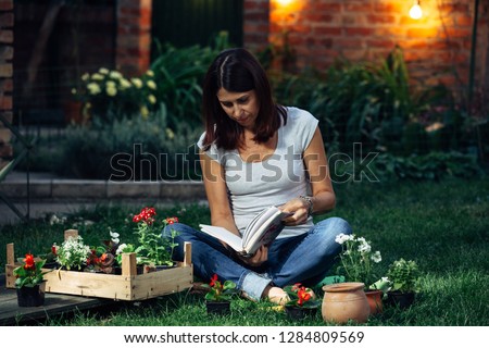woman with her seedlings in garden