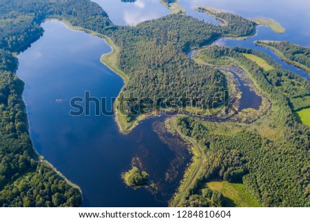 Aerial view of blue lakes and green forests on a sunny summer day in Lithaunia. drone photography - Image
