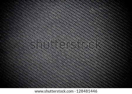 Black rubber pattern background.