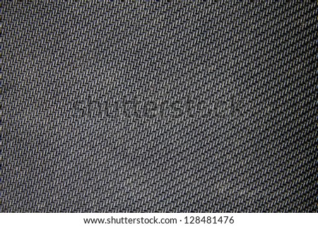 Black rubber pattern background.