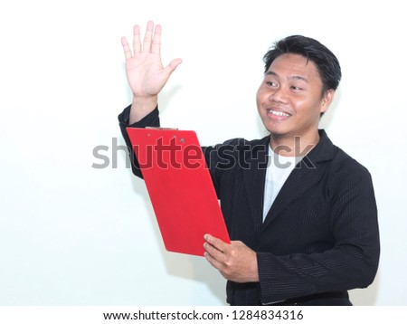 Portrait of Asian man with clipboard display and the concept of directing workers