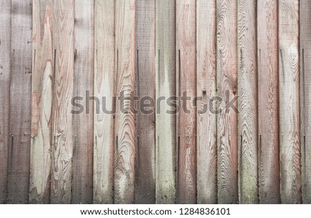 Part of a wooden fence as a background