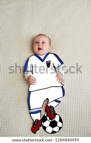 Baby dressed up as football player