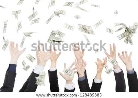 Many dollars falling on business people hand