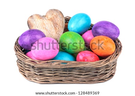 Easter eggs in the basket  on a white background