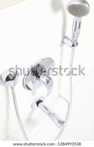 Shower head in bathroom with water spray or water flow. modern shower head in modern bathroom