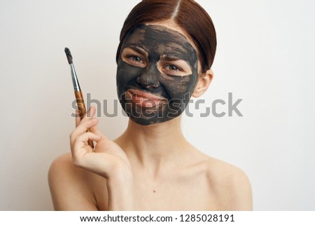 beautiful woman cares for the face spa procedure