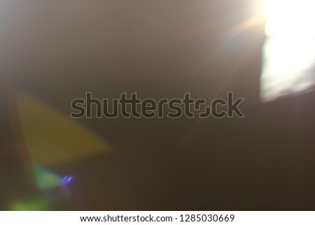 Abstract background. Sun Rays on black background.  Flare with rays.