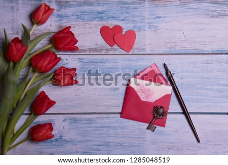 red hearts and love letter for valentines day 