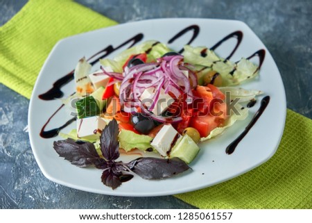 Greek salad with fresh vegetables, feta cheese and black olives pic