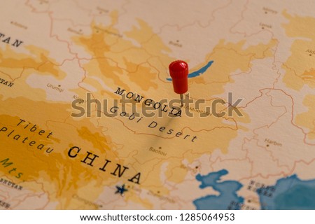a pin on Ulaanbaatar, mongolia in the world map