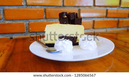  Chocolate Cheese Cake on wooden table in cafe