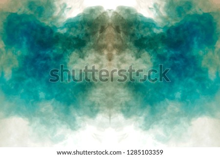 Puffs of multi-colored smoke scattering on a white background and rising up like flames of blue and white fire, taking on the mystical shape of an alien's head.