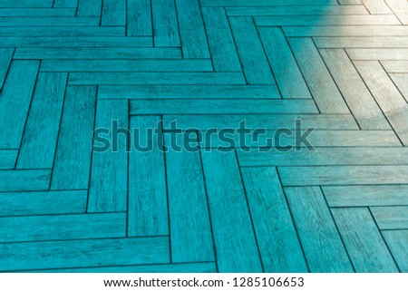 Seamless Fragment of Turquoise wood parquet texture (chevron old)