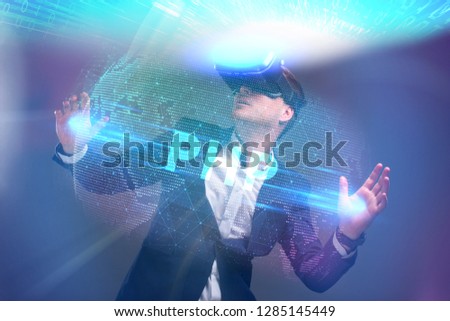Business, Technology, Internet and network concept. Young businessman working in virtual reality glasses sees the inscription: PHP