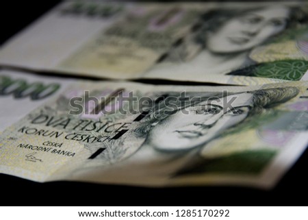Czech money on a black background