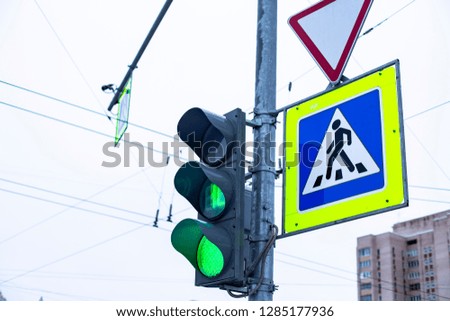 traffic lights with road signs