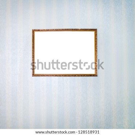 Pictur in grunge frames on a wall  against wallpaper background