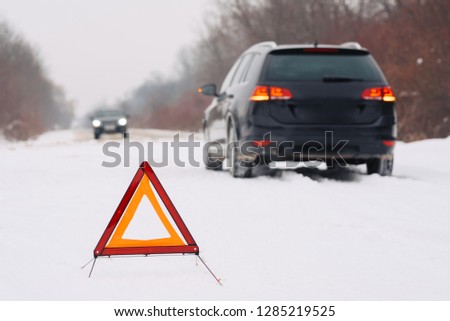 Winter driving - car breakdown Car breakdown on a country road in winter.
