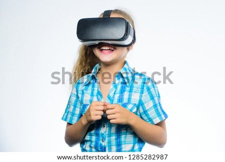 Girl cute child with head mounted display on white background. Small kid use modern technology virtual reality. Virtual education for school pupil. Get virtual experience. Virtual reality concept.