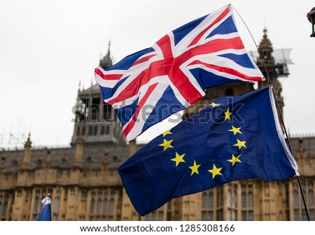European Union and British Union Jack flag flying together. A symbol of the Brexit EU referendum Royalty-Free Stock Photo #1285308166