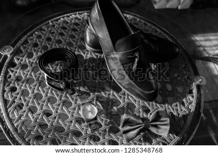 details of the wedding morning of the bride's shoes, strap, butterfly, watches