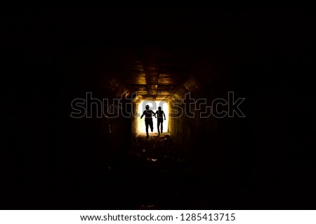 escape from the dark tunnel
 Royalty-Free Stock Photo #1285413715
