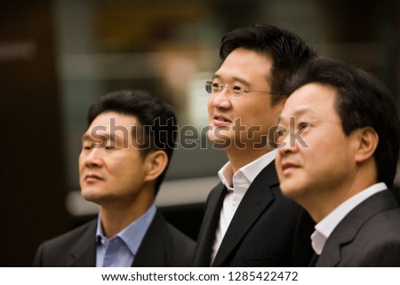 Group of mid-adult businessmen.