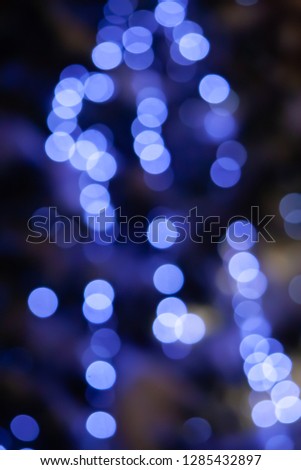 Blue lights bokeh background. Blue rounds of lights bokeh