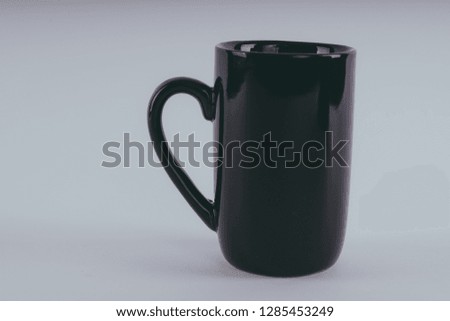 black mug empty blank for coffee or tea isolated on white background with clipping path

