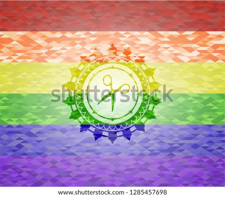 scissors icon inside emblem on mosaic background with the colors of the LGBT flag