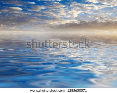 reflection of the sunny cloudy sky in the calm surface of the reservoir