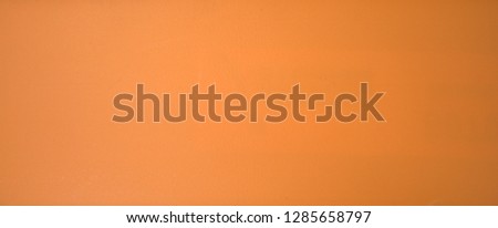 Orange monochrome background, horizontally positioned. Gradient.
