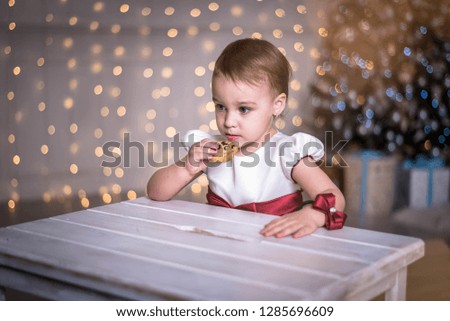 little girl in white holiday dress