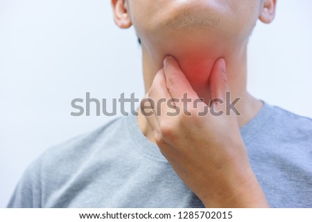 Closeup, Elderly men have a sore throat. Medical and healthcare concept. Royalty-Free Stock Photo #1285702015