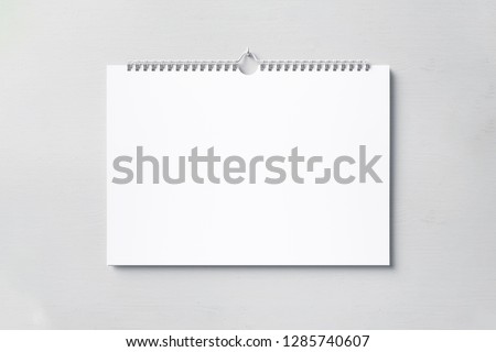Stock cover Wall calendar mock up on a gray background. High resolution.