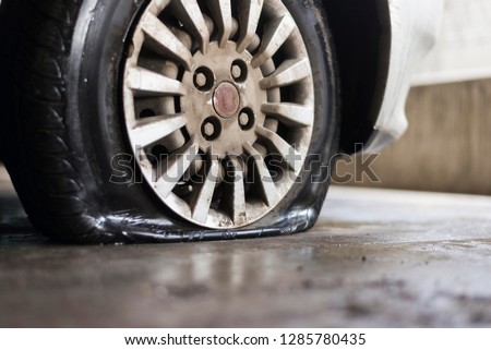 Car flat tyre.