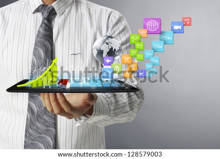 touch screen ,touch- tablet in hands Royalty-Free Stock Photo #128579003