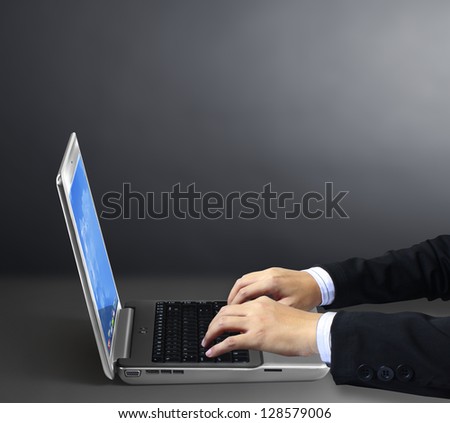 Businessman with laptop in his hands