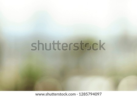 City concept: Blurred abstract glass wall building background