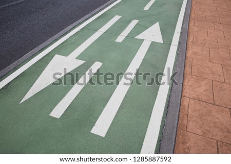 Arrow Symbols on Cycle Lane