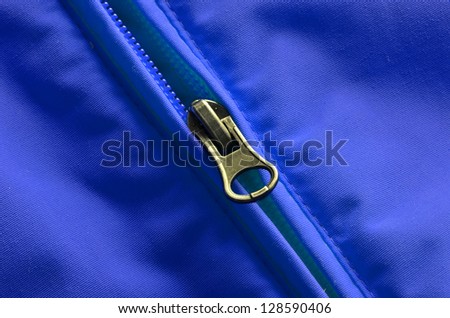 Closeup of zipper on coat with texture