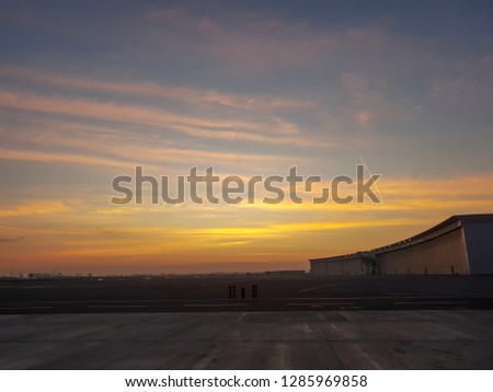 Sunrise over the airport apron