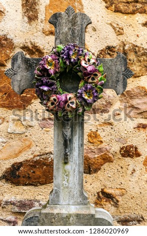 Cross on stone background