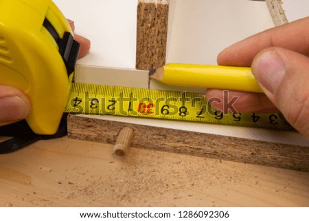 Furniture assembly. Master ruler measure fragment furniture